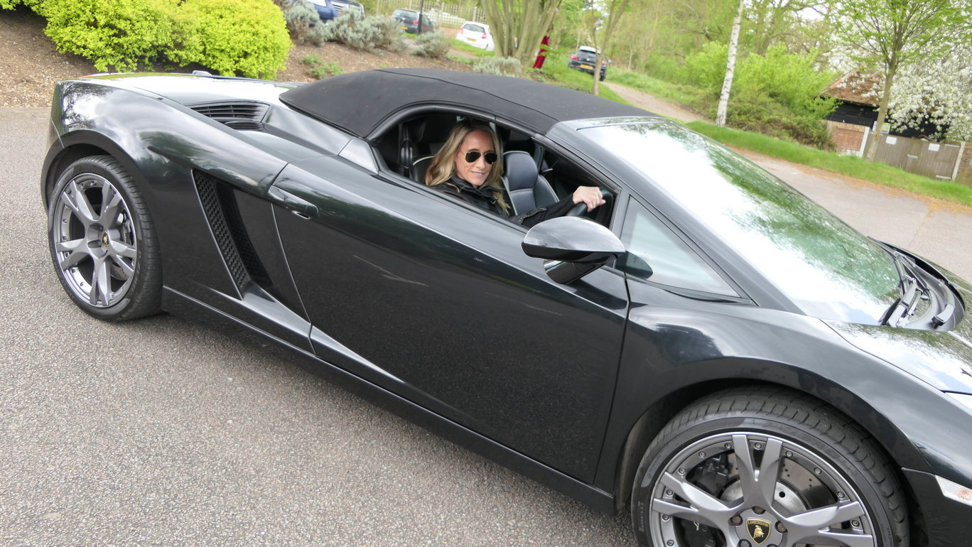 driving Lamborghini super car luxury lifestyle